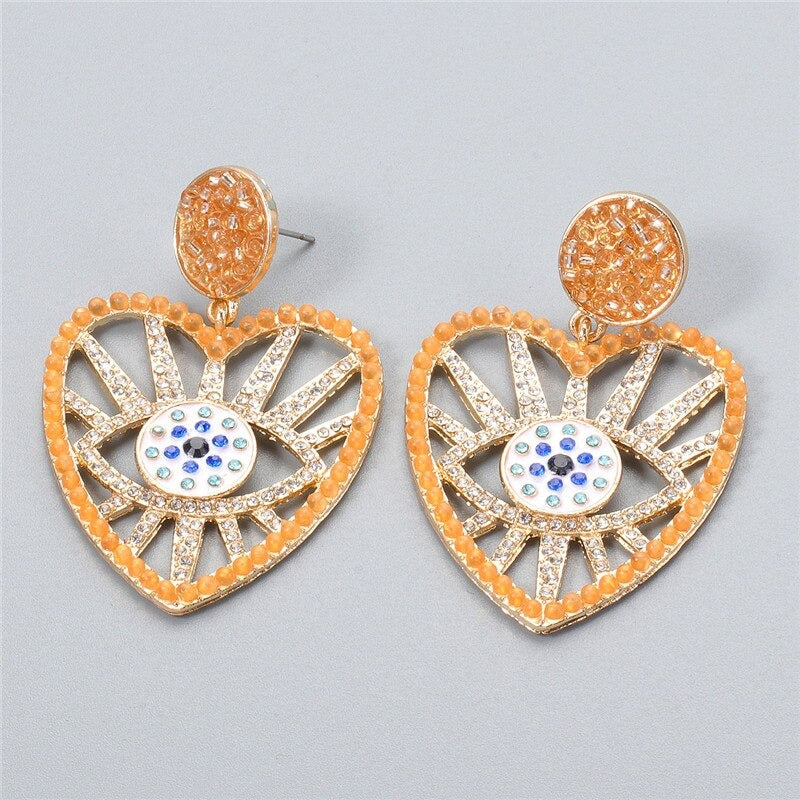 Statement-Ohrringe im Hippie- und Trendy-Stil in Herzform mit Glücksaugen-Tropfen