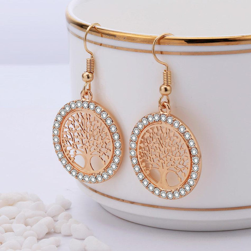 Ausgehöhlte Ohrhänger mit Lebensbaum-Nieten