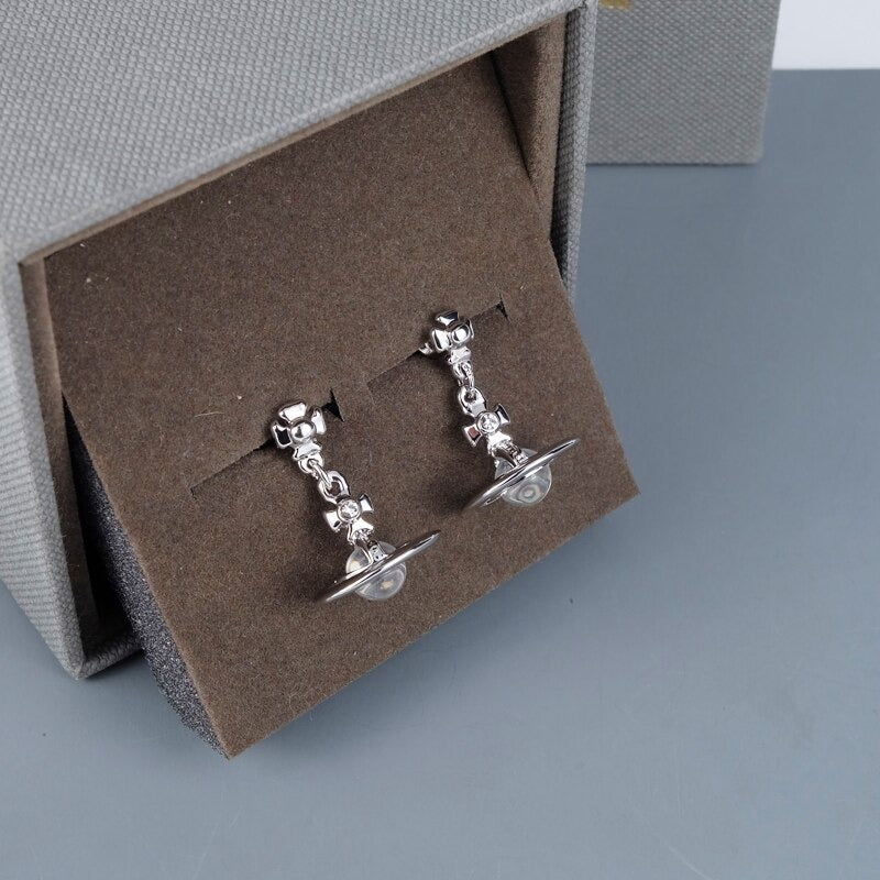 Ohrhänger mit Planeten im Interstellar-Stil