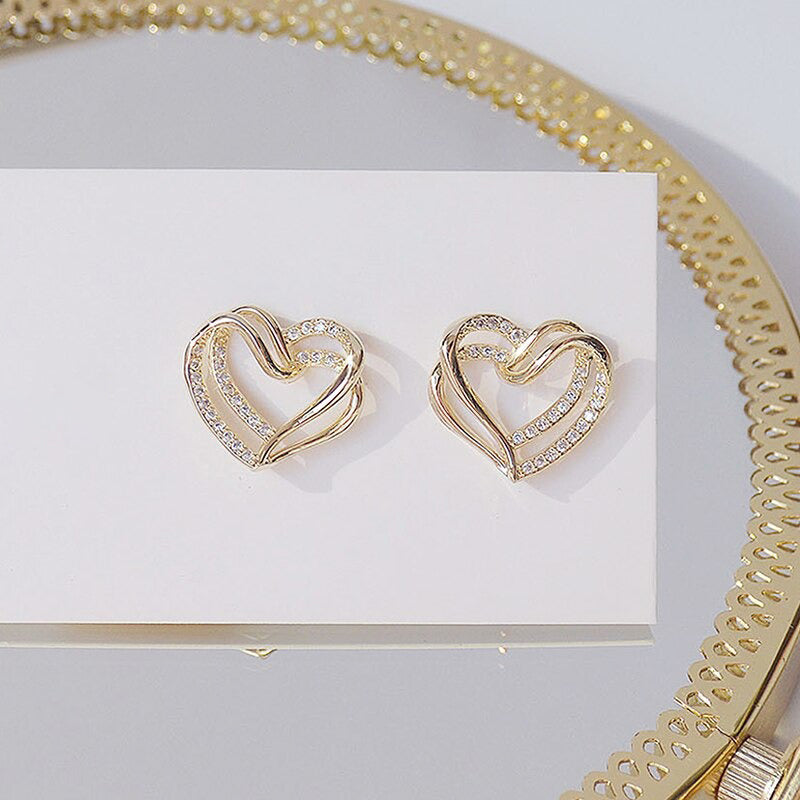 Filigrane doppellagige Ohrstecker mit hohlem Zirkonia in Herzform