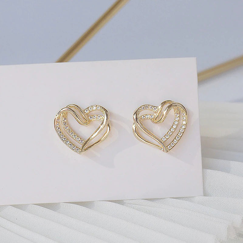 Filigrane doppellagige Ohrstecker mit hohlem Zirkonia in Herzform