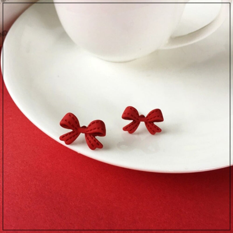 Jolly Chic – Rote Ohrringe mit Schleife