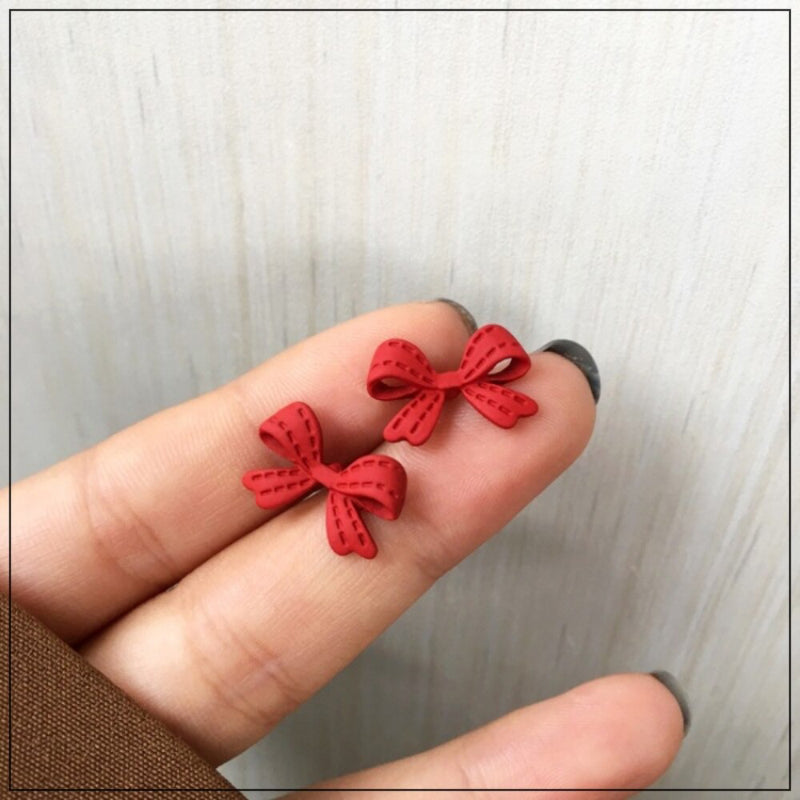 Jolly Chic – Rote Ohrringe mit Schleife