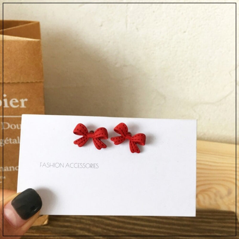 Jolly Chic – Rote Ohrringe mit Schleife