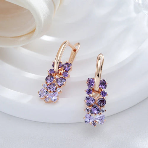 Ameythst Perennial Optics Roségoldene Ohrringe mit Zirkoniasteinen