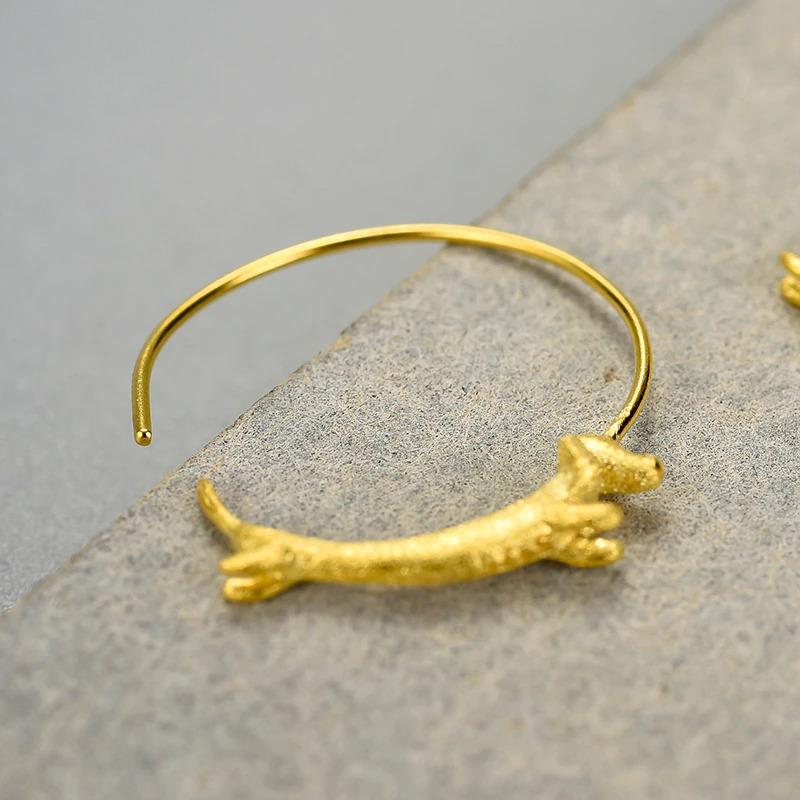 Ohrringe mit springendem Dackel