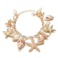 Schönes Muschel- und Seestern-Armband mit Kunstperlen-Anhängern