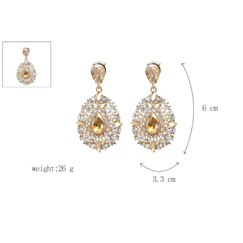 Luxuriöse lange Tropfenohrringe mit Strasssteinen besetzt