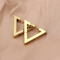 Ohrringe mit geometrischen Figuren in Gold, Silber und Schwarz