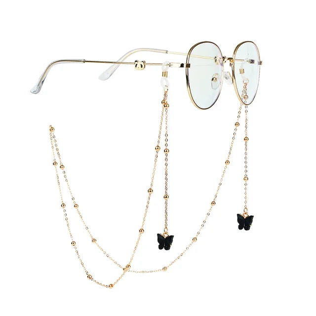 Brille mit goldener Kette und Perlen- und Silberakzenten