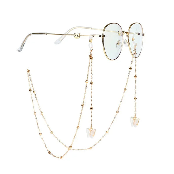 Brille mit goldener Kette und Perlen- und Silberakzenten