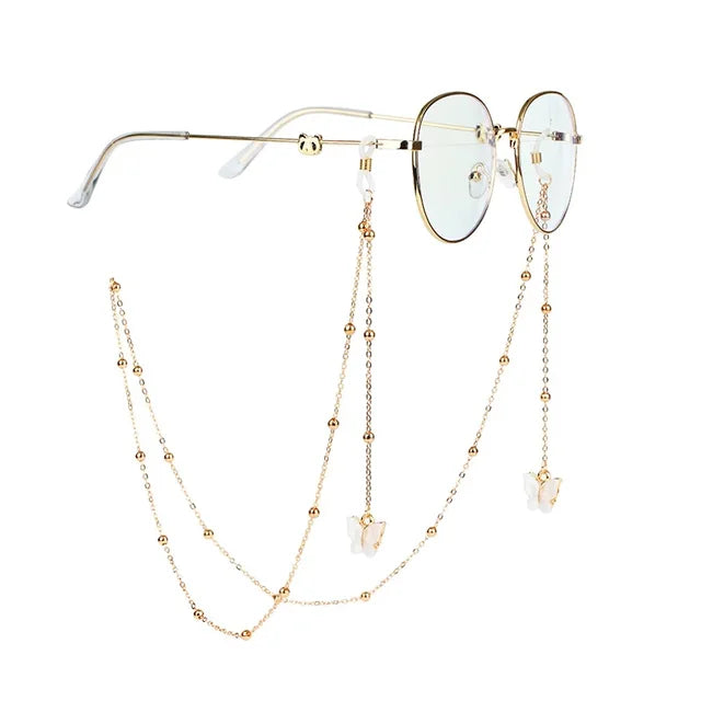Brille mit goldener Kette und Perlen- und Silberakzenten