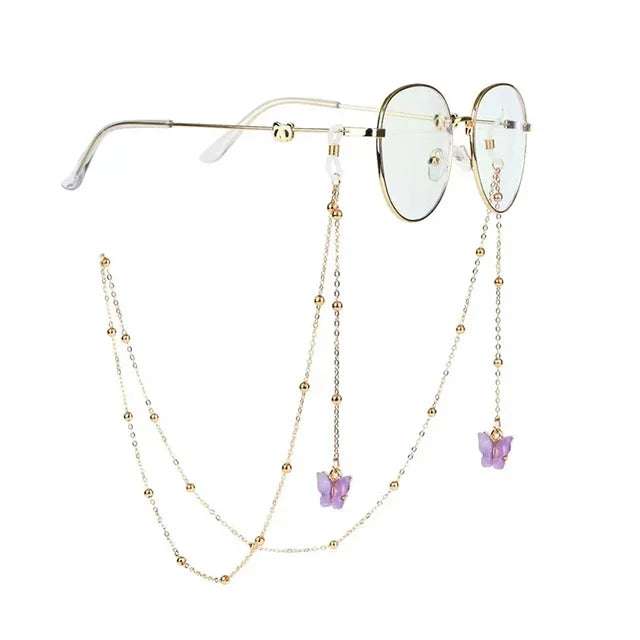 Brille mit goldener Kette und Perlen- und Silberakzenten