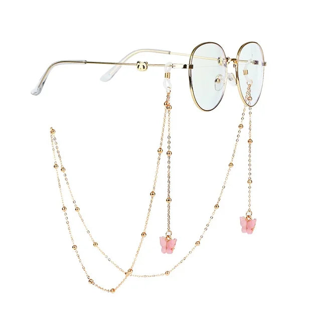 Brille mit goldener Kette und Perlen- und Silberakzenten