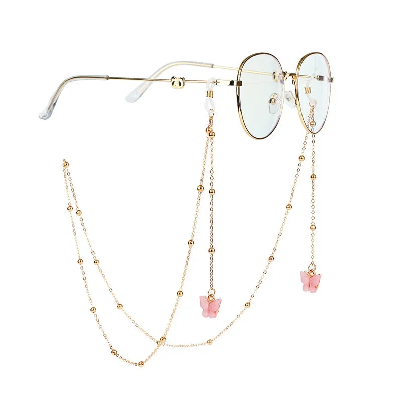 Brille mit goldener Kette und Perlen- und Silberakzenten