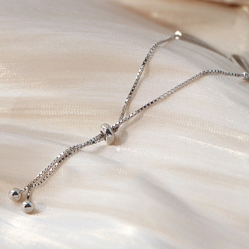 Minimalistische Armbänder mit Schleife und Zirkonia