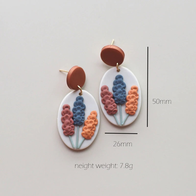 Mehrfarbige handgefertigte Creolen mit Blumenmuster