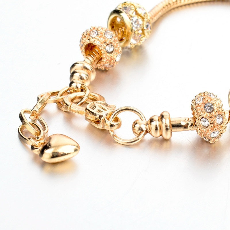 Mehrfarbige, mit Strasssteinen besetzte Luxusarmbänder mit Herzanhänger