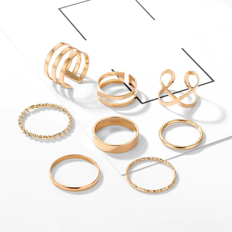 Offenes Ringset mit geometrischen Kreuzverdrehungen in mehreren Stilen