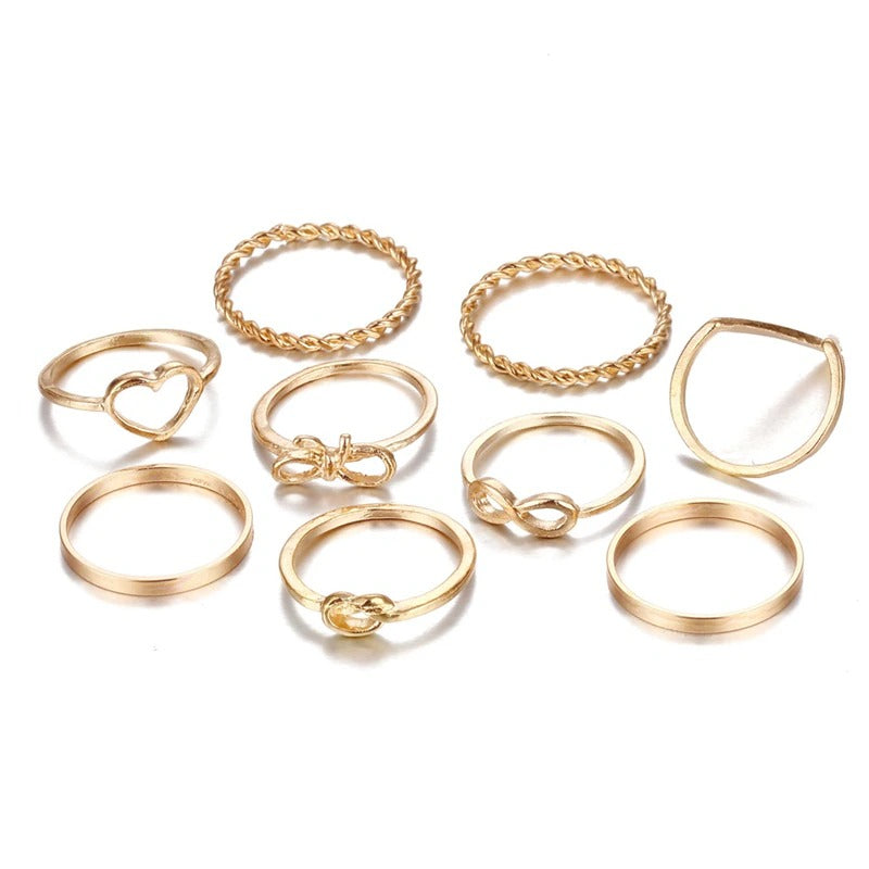 Offenes Ringset mit geometrischen Kreuzverdrehungen in mehreren Stilen