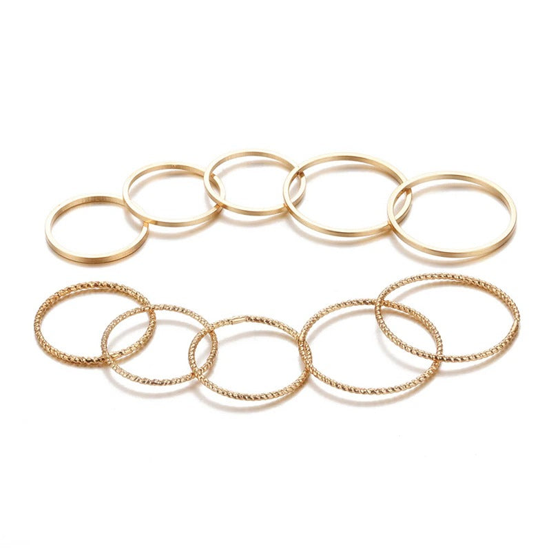 Offenes Ringset mit geometrischen Kreuzverdrehungen in mehreren Stilen