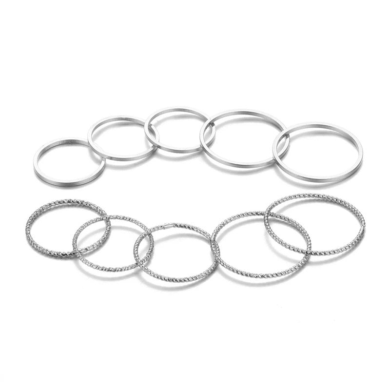 Offenes Ringset mit geometrischen Kreuzverdrehungen in mehreren Stilen