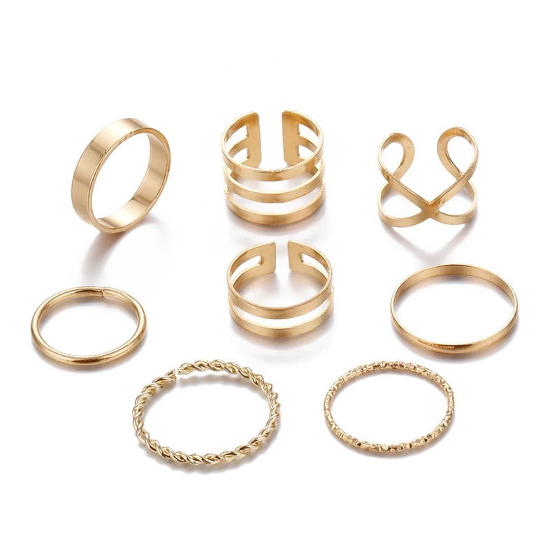 Offenes Ringset mit geometrischen Kreuzverdrehungen in mehreren Stilen