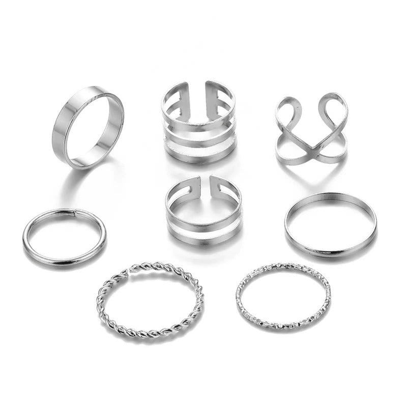 Offenes Ringset mit geometrischen Kreuzverdrehungen in mehreren Stilen