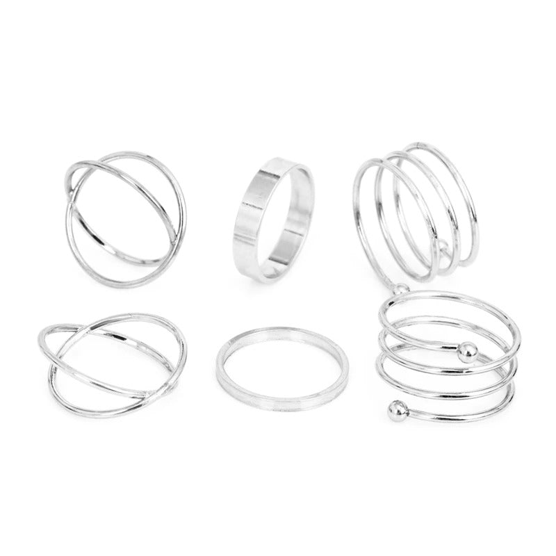 Offenes Ringset mit geometrischen Kreuzverdrehungen in mehreren Stilen