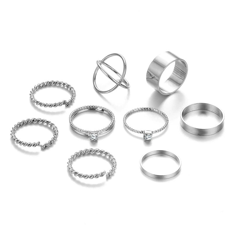 Offenes Ringset mit geometrischen Kreuzverdrehungen in mehreren Stilen