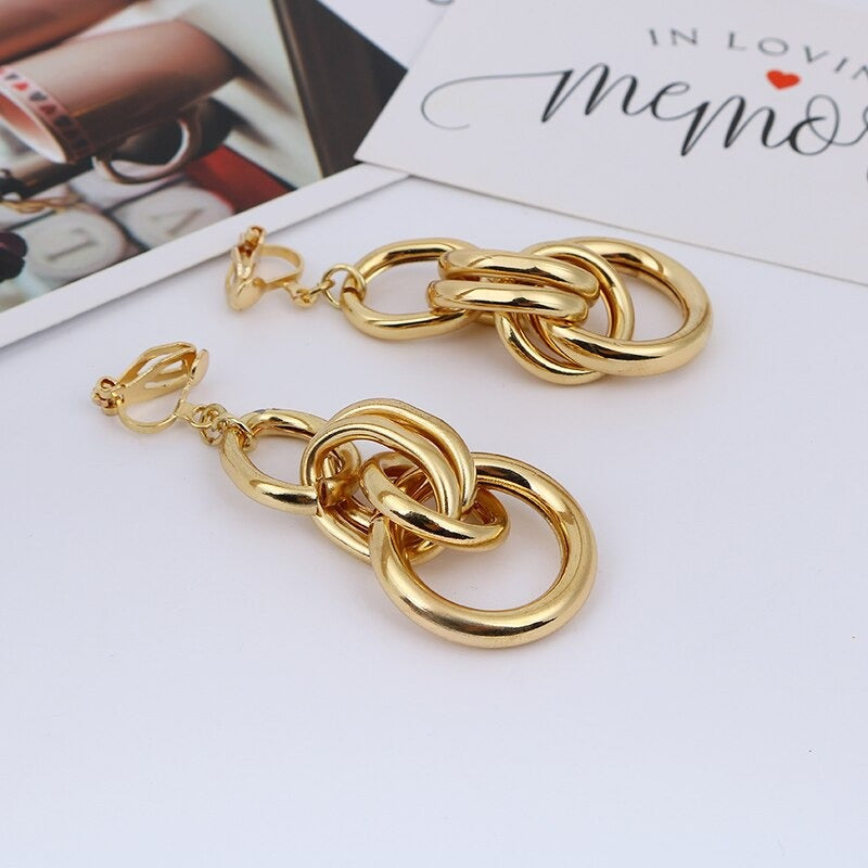 Geometrische Creolen-Ohrclips mit Knoten in verschiedenen Stilen