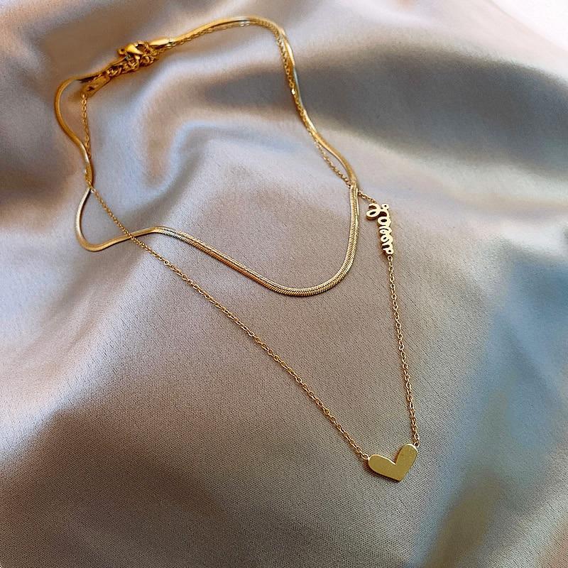 Luxuriöse Halsketten mit vertikalem Muschel-Anhänger in verschiedenen Stilen