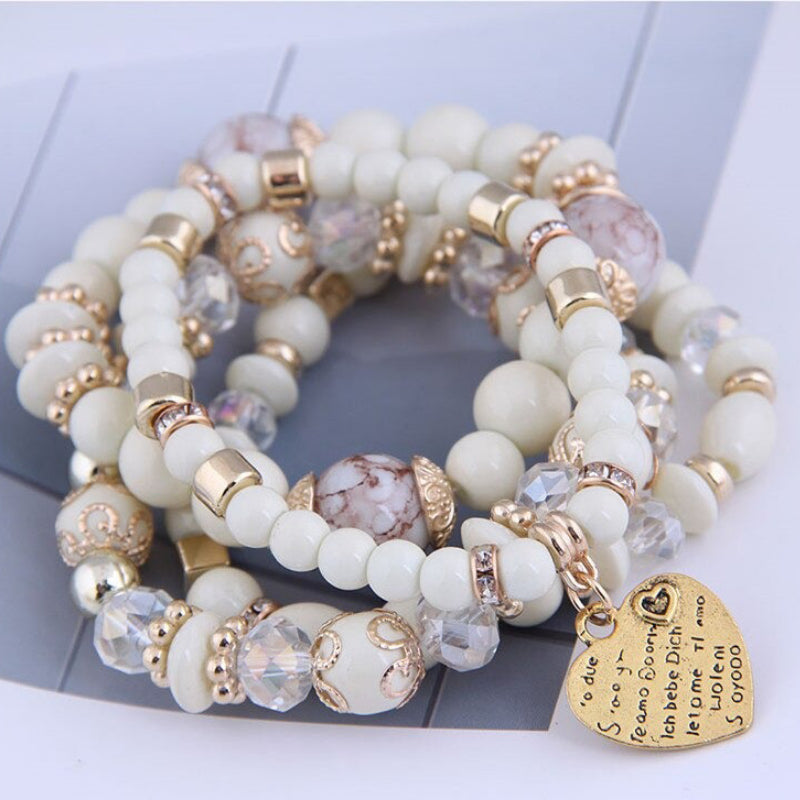 Mehrlagiges Bohemian-Perlenarmband mit Herzanhänger