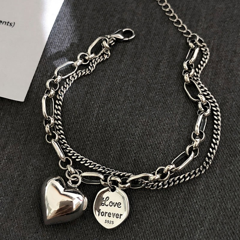 Mehrlagiges Armband mit Herzanhängern „Love Forever“