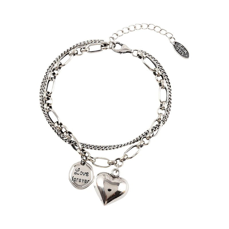 Mehrlagiges Armband mit Herzanhängern „Love Forever“