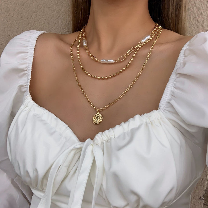 Mehrlagige dicke Chokerkette mit Perlen- und Herzanhänger