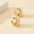 Konische Halbmond-Ohrringe in Gold und Silber für einen klassischen Look