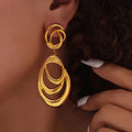 Elegante hypoallergene goldene Loop-Ohrringe
