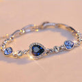 Ozeanblauer Armreif mit Kristall-Strass in Herzform