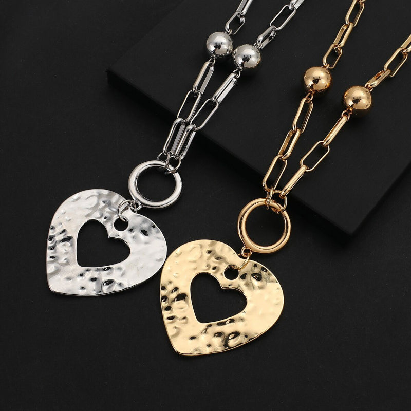 Übergroße Halsketten mit langem Kettenanhänger in Herzform