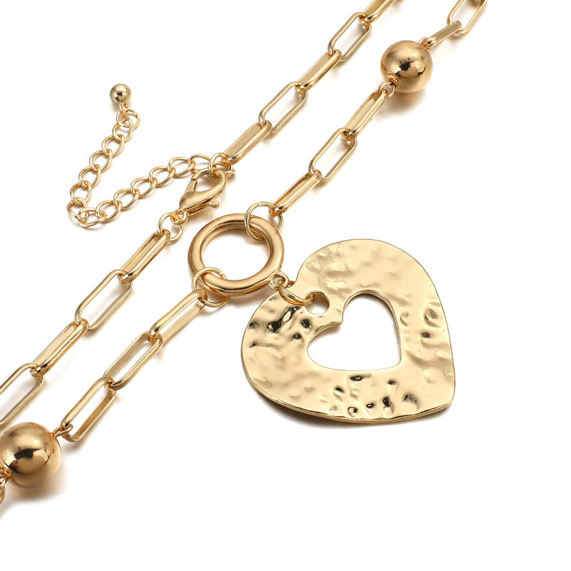 Übergroße Halsketten mit langem Kettenanhänger in Herzform