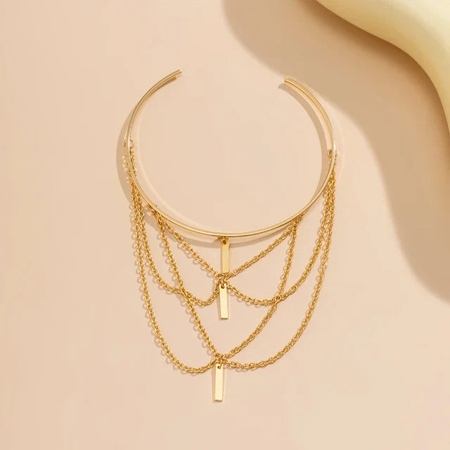 Elegante Armkette - mehrlagig, verstellbar, Quaste in Gold & Silber