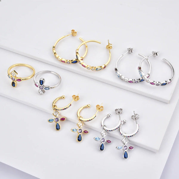 Schmuckkollektion mit Regenbogenkreuz und Zirkonia