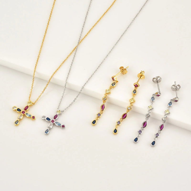 Schmuckkollektion mit Regenbogenkreuz und Zirkonia