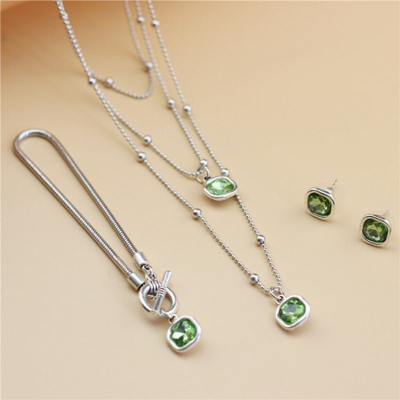 Schmuckset mit Halskette, Ohrringen und Armband in Retro-Quadratform mit Strasssteinen