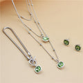Schmuckset mit Halskette, Ohrringen und Armband in Retro-Quadratform mit Strasssteinen