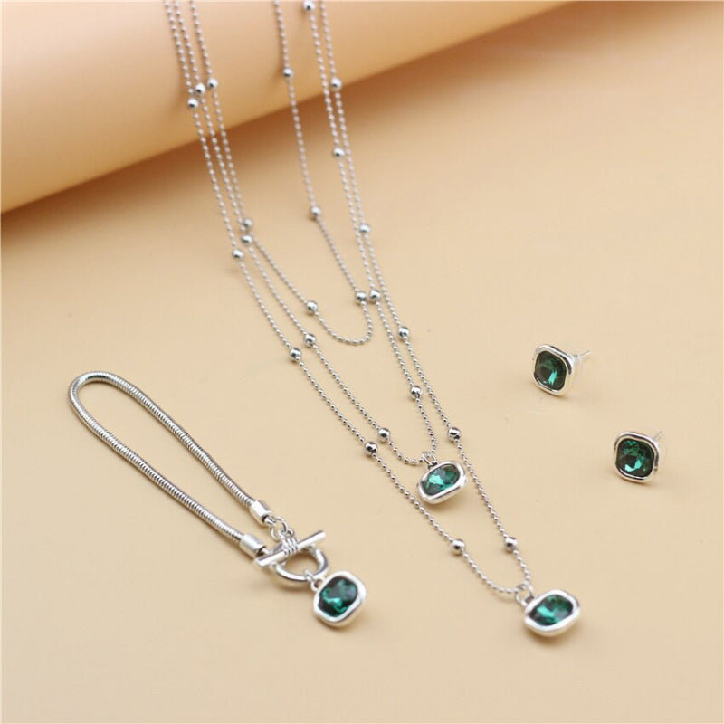 Schmuckset mit Halskette, Ohrringen und Armband in Retro-Quadratform mit Strasssteinen