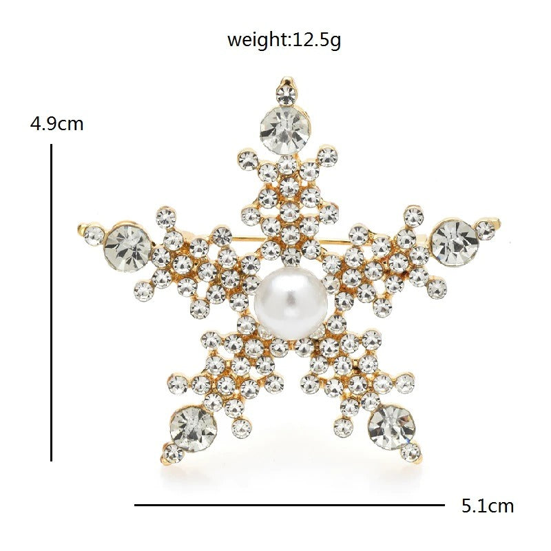 Mit Strasssteinen besetzte, sternförmige Modebroschen