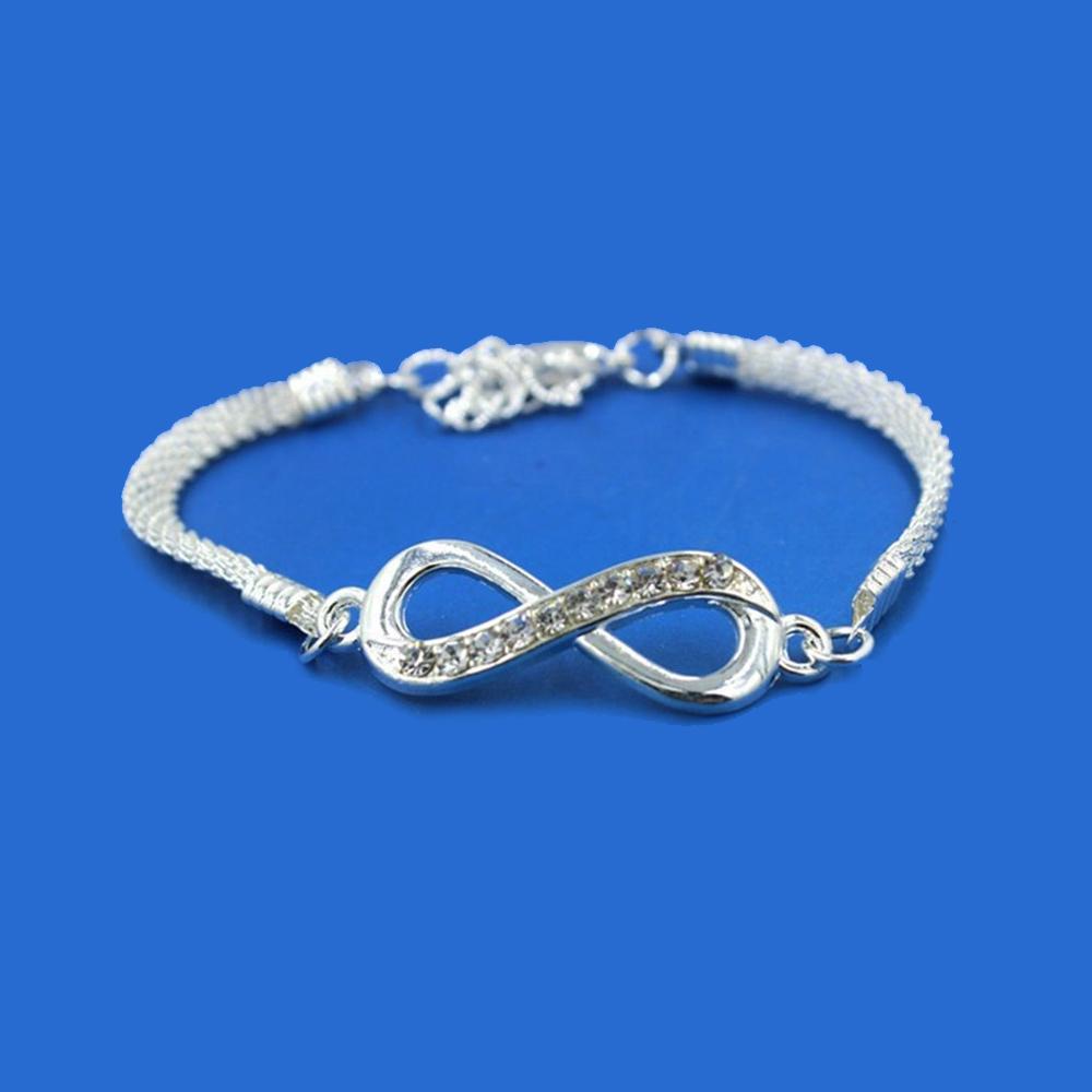 Mit Strasssteinen besetztes, luxuriöses Infinity-Armband aus Zinklegierung