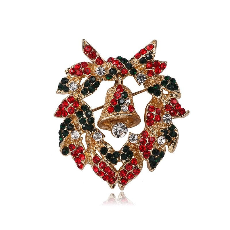 Weihnachtsbrosche „Holiday Galore“ mit Strasssteinen verziert